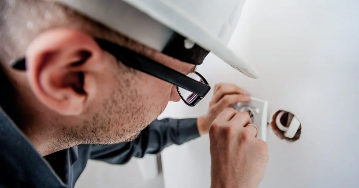 Electrician website design example with a polished trade-service hero image