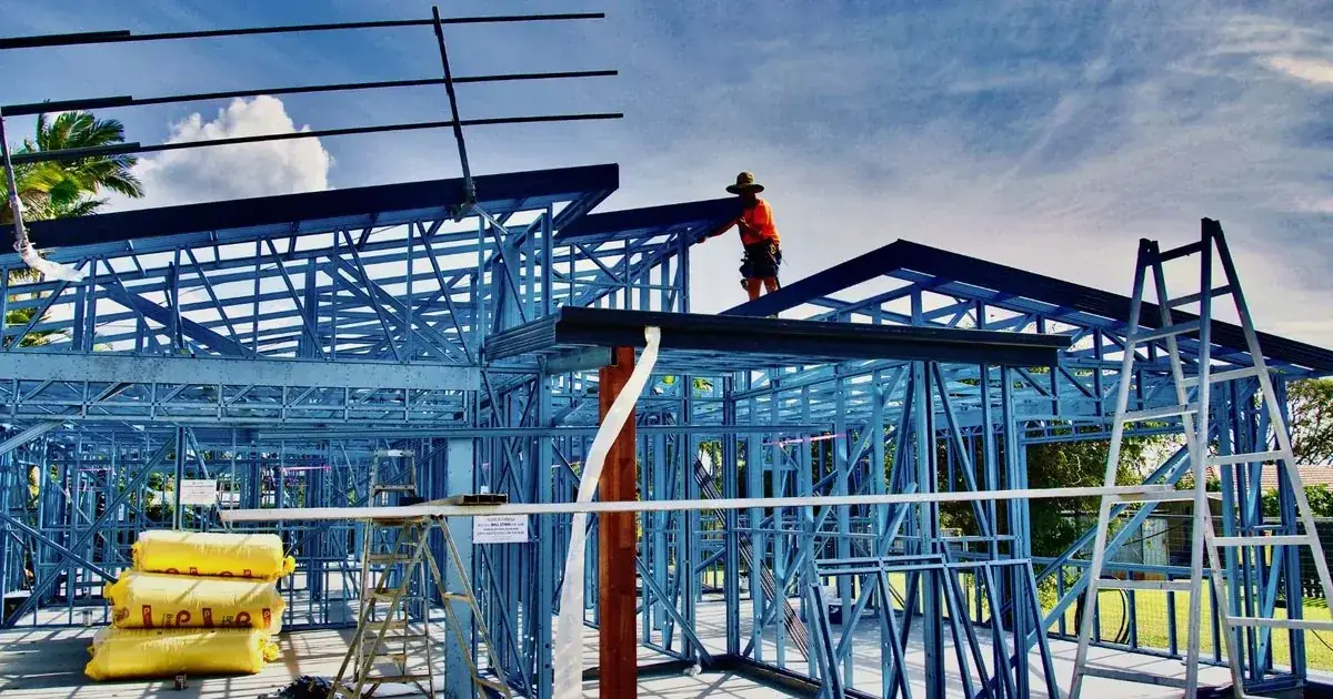 Home remodeler website design example with a warm kitchen hero image