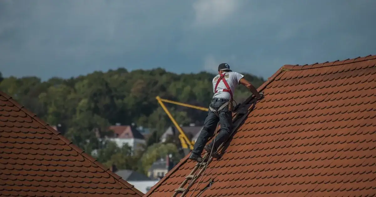 Roofer website design example with a premium residential roof hero image